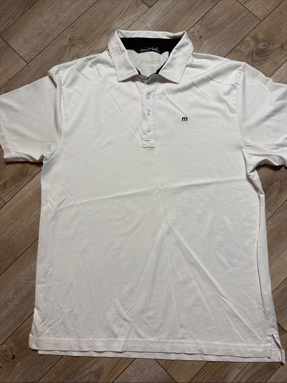 Travis Mathew White Polo with Black Trim